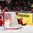 MINSK, BELARUS - MAY 11: Switzerland's Reto Schappi #19 gets knocked down after scoring a first period goal against Belarus' Vitali Koval #1 while Sergei Kostitsyn #74 and Victor Stancescu #37 look on during preliminary round action at the 2014 IIHF Ice Hockey World Championship. (Photo by Andre Ringuette/HHOF-IIHF Images)


